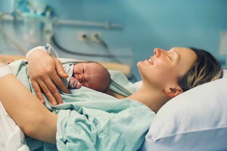 Mother and newborn. Child birth in maternity hospital Mother and newborn. Child birth in maternity hospital